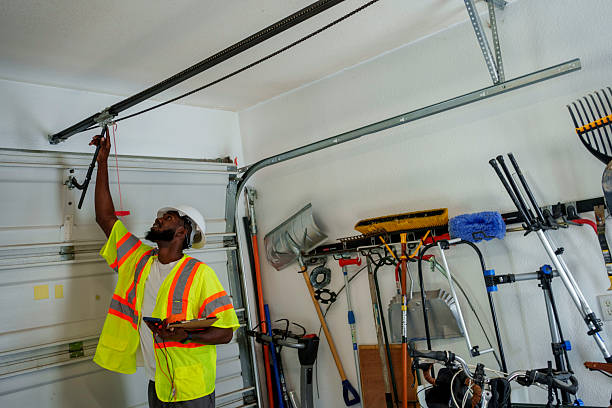 Professional Garage Door Panel Replacement technician working in Clayton, NM